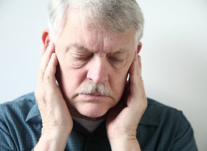 old man with jaw pain