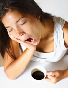 tired yawning cup of coffee