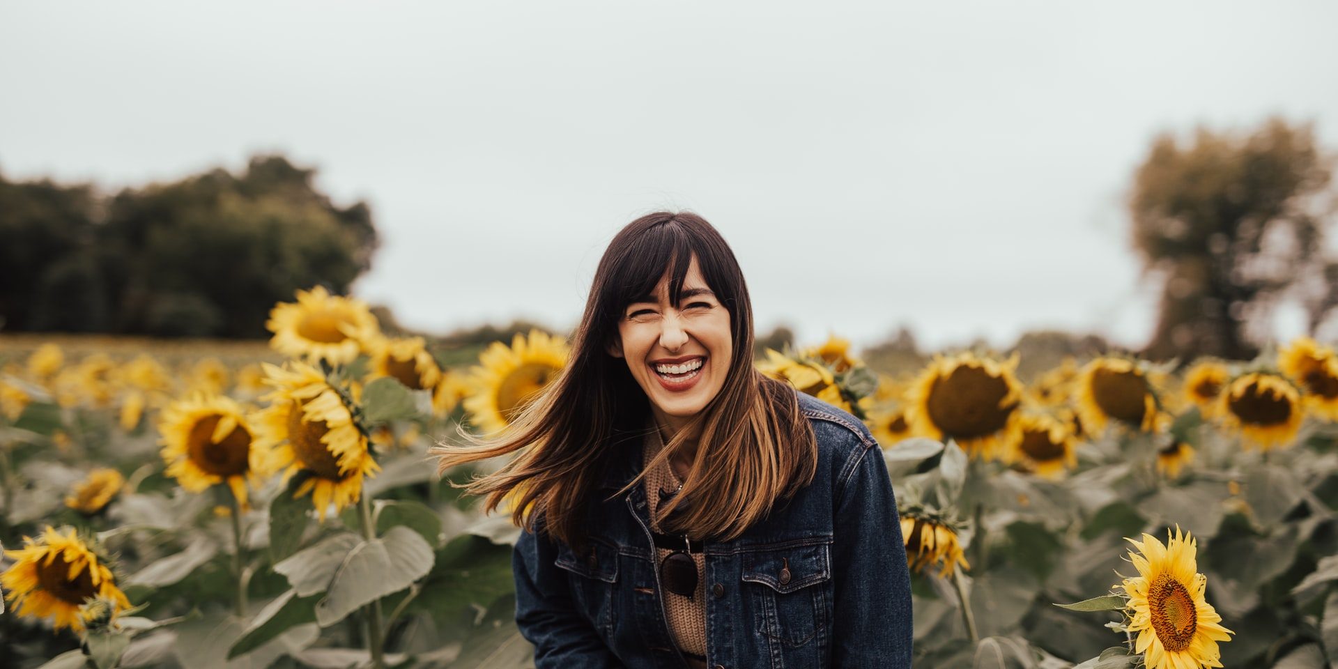 women smiling in sunflower field-restorative dentistry women smiling in sunflower field-restorative dentistry