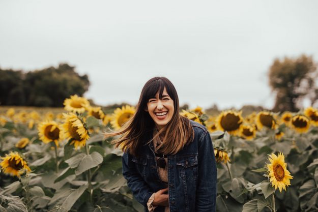 women smiling in sunflower field-restorative dentistry women smiling in sunflower field-restorative dentistry